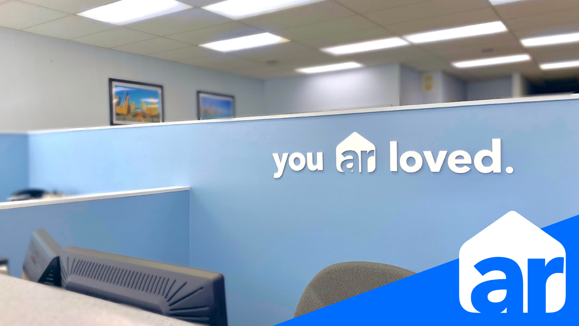 Photo of front desk with text - you are loved